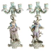 A pair of Meissen figural candelabra of a gardener and companion  A pair of Meissen (outside