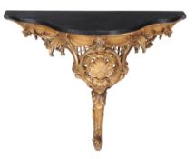A carved giltwood console table in mid 18th century style, 19th century  A carved giltwood console