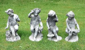 A set of four lead garden figures emblematic of the four seasons  A set of four lead garden