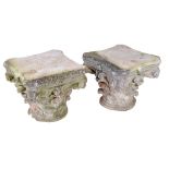 A pair of stone composition column capitals, 20th century, of Corinthian order  A pair of stone