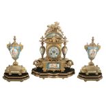 A French gilt metal and Sevres style porcelain mantel clock garniture, unsigned  A French gilt metal