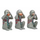 A group of three modern Chinese porcelain models of monkeys  A group of three modern Chinese