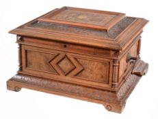 A Swiss carved and marquetry decorated walnut fifteen-inch disc music box  A Swiss carved and