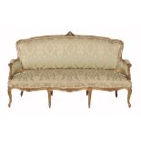 A carved giltwood sofa in Louis XV style, last quarter 19th century  A carved giltwood sofa in Louis