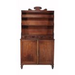 A Regency mahogany waterfall cabinet bookcase , circa 1815  A Regency mahogany waterfall cabinet