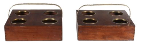 A pair of George III mahogany and brass mounted decanter carriers, circa 1810