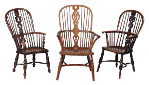 A yew, ash and elm high back Windsor armchair , second quarter 19th century