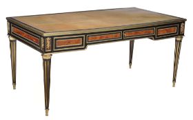 A French ebony, kingwood and gilt metal mounted writing table
