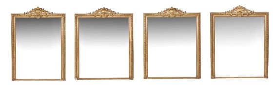 A set of four Victorian giltwood and composition wall mirrors, circa 1870