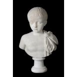 An Imperial Roman sculpted marble head of a young boy, circa 1st Century A.D