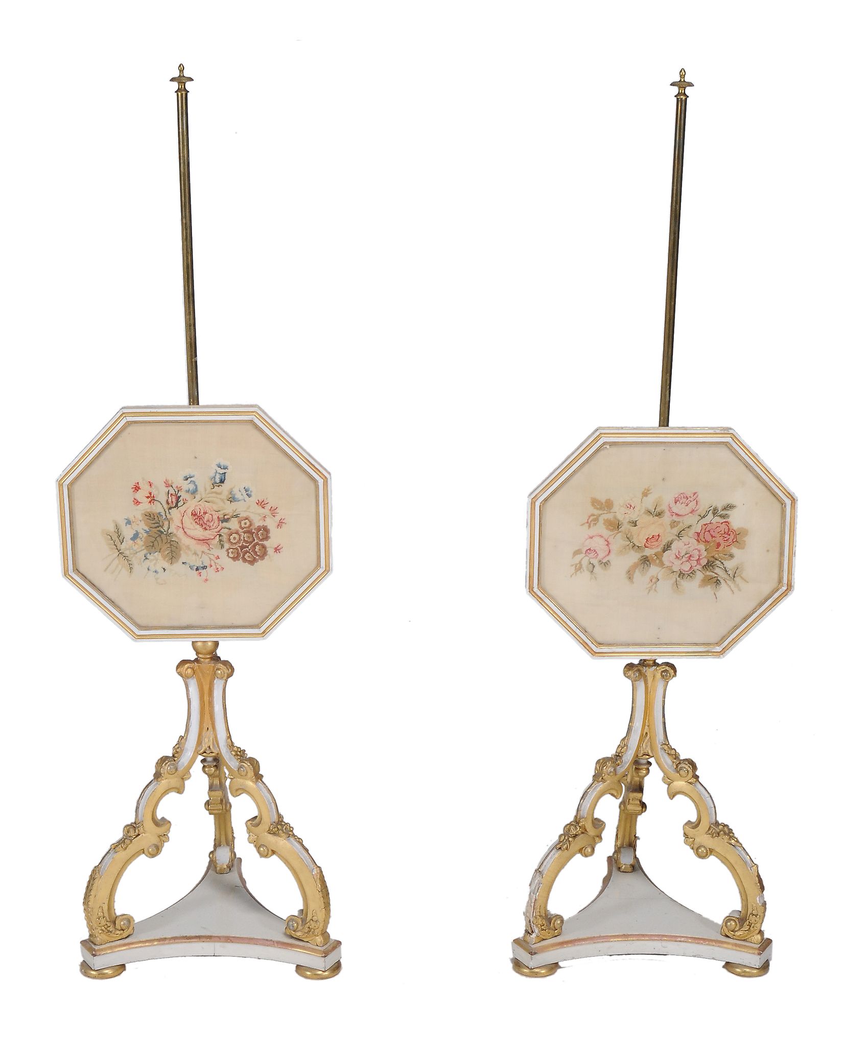 A pair of Regency painted and parcel gilt polescreens, circa 1815