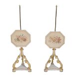 A pair of Regency painted and parcel gilt polescreens, circa 1815