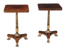 A pair of Regency rosewood, ebonised and parcel gilt occasional tables