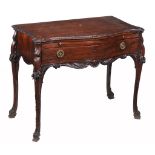 A George III mahogany side table, circa 1770, the serpentine shaped top with decorative leaf