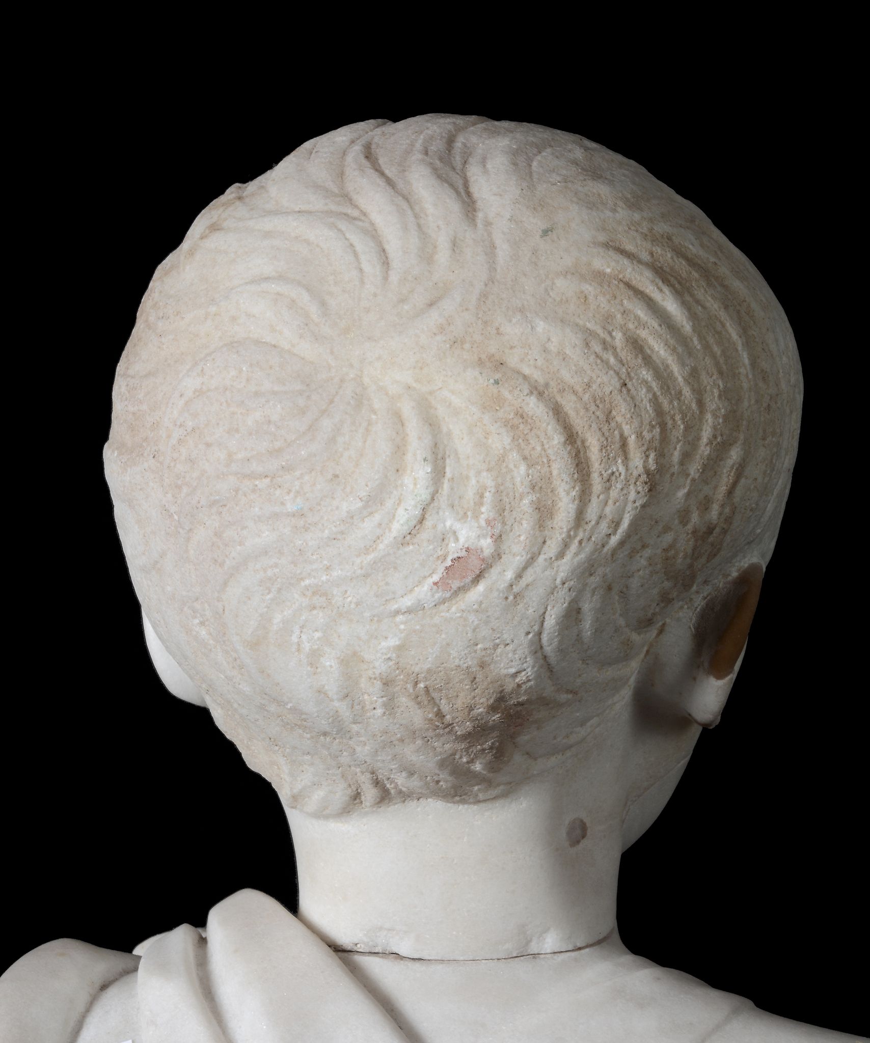 An Imperial Roman sculpted marble head of a young boy, circa 1st Century A.D - Image 3 of 6