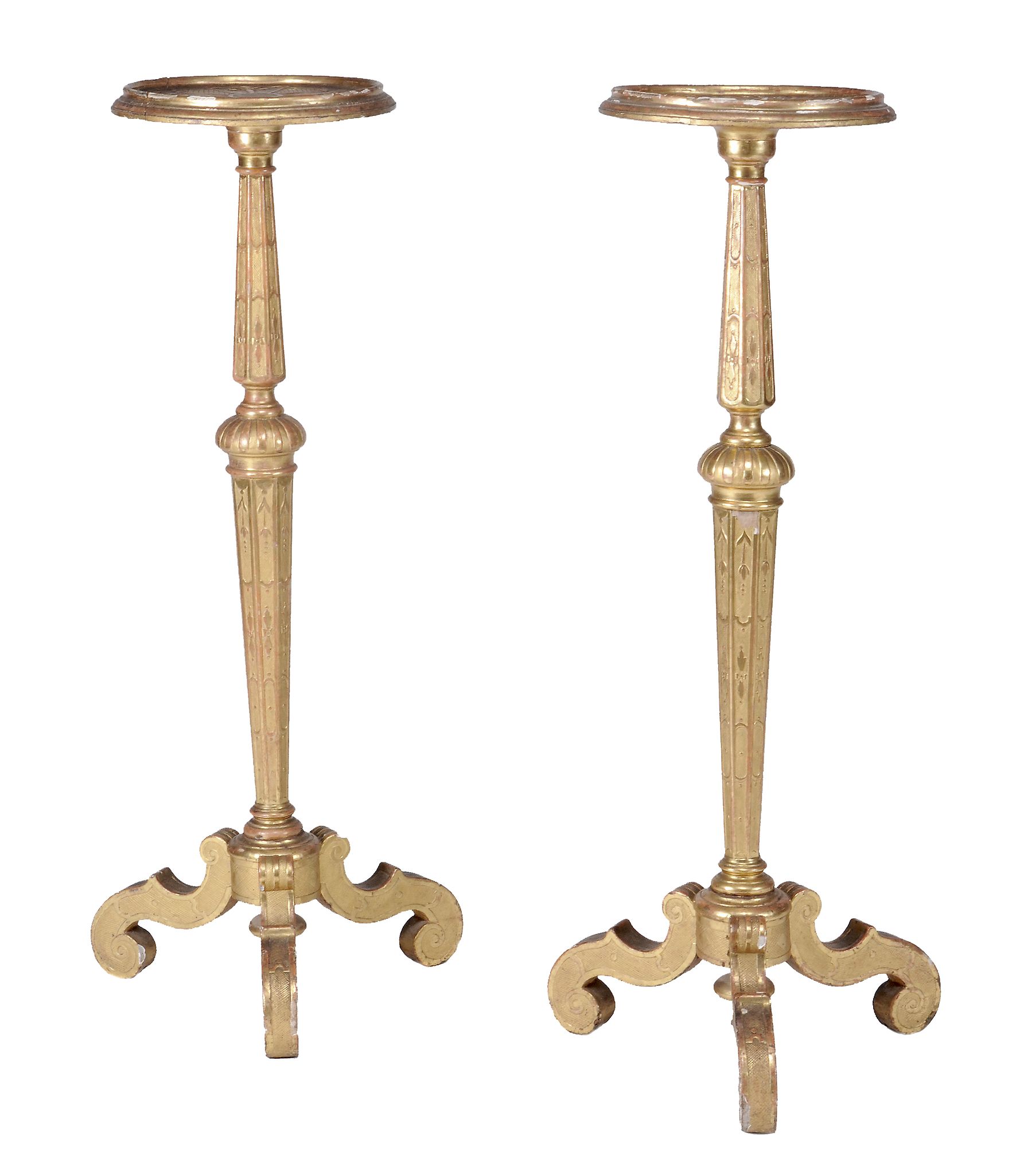 A pair of George I giltwood and gesso torcheres , circa 1720