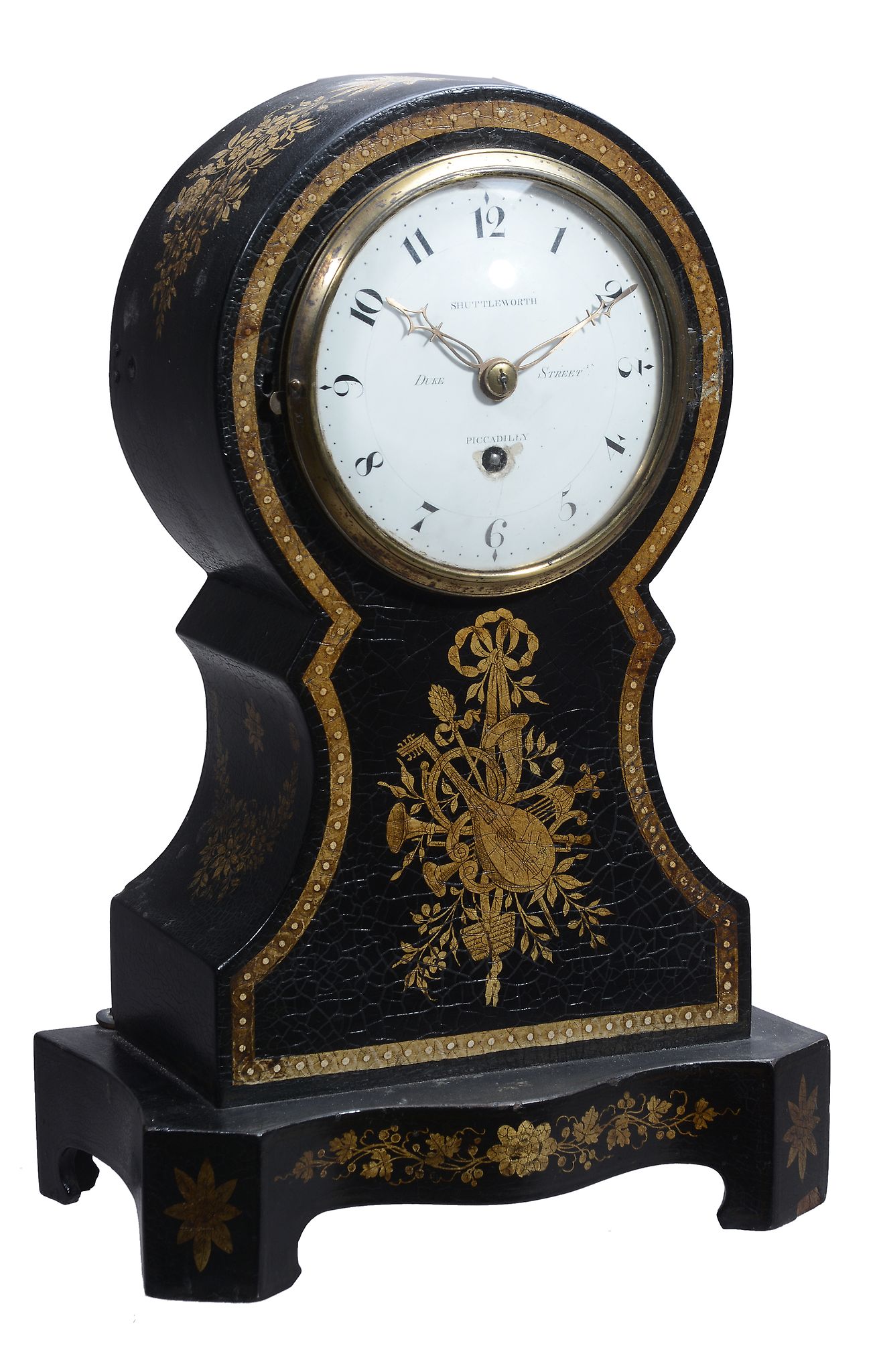 A Regency papier mache mantel timepiece Francis Shuttleworth, London