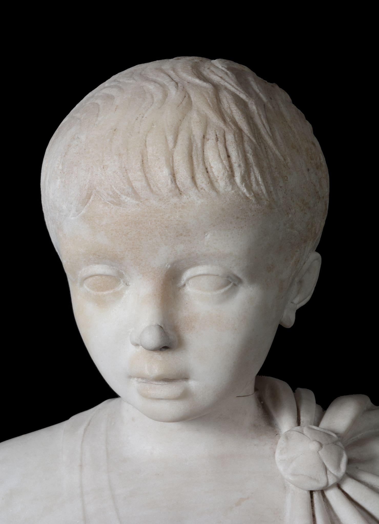 An Imperial Roman sculpted marble head of a young boy, circa 1st Century A.D - Image 6 of 6