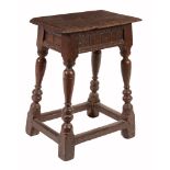 A Charles II oak joint stool, circa 1680, the top with moulded edge