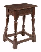 A Charles II oak joint stool, circa 1680, the top with moulded edge