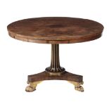 A Regency rosewood, parcel gilt and brass inlaid centre table, circa 1810