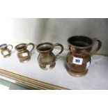 Set of five brass graduated spirit measures -5