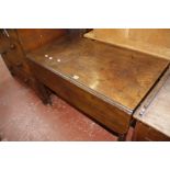 A George III mahogany dropleaf table with a single end drawer on turned supports.