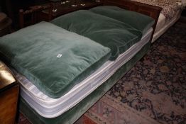 A green velvet upholstered daybed bearing Maple & Co label to the underside Best Bid