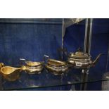 A Walker and Hall silver gravy boat, Sheffield 1931, 3.8 troy oz approx. and an EPNS silverplated