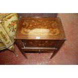 A Dutch marquetry bedside cabinet enclosed by a tambour door