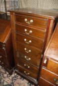 A mahogany Wellington chest, seven graduated drawers with lockable side flap.122cm high x 56cm