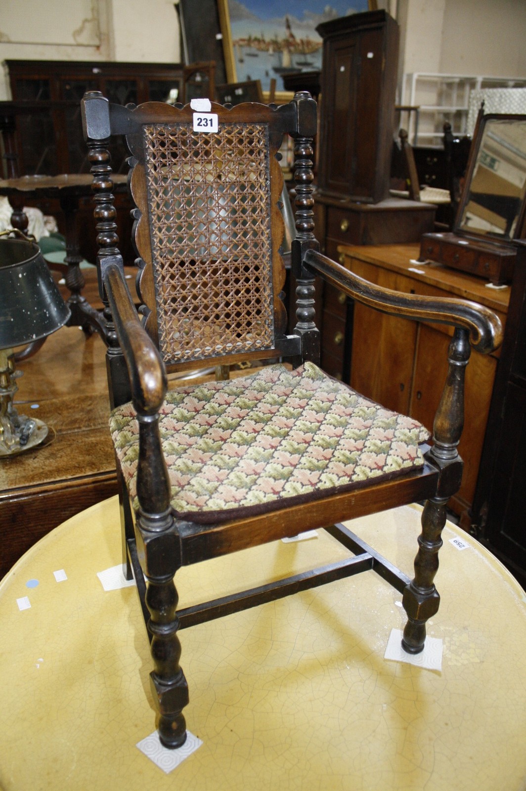 A stained beech childs chair in 17th Century style