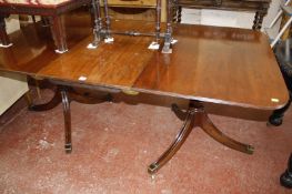 A Georgian style mahogany double pedestal dining table,178cm x 104cm.