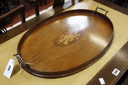 An early 20th century mahogany oval brass handled tray with drum and horn inlay. 53cm x 36cm