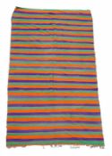 A Moroccon carpet of striped design in orange and purple approximately 184 x 398cm