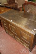 A 19th Century oak mule chest, with three FALSE drawers and two drawers to the base.116cm wide x