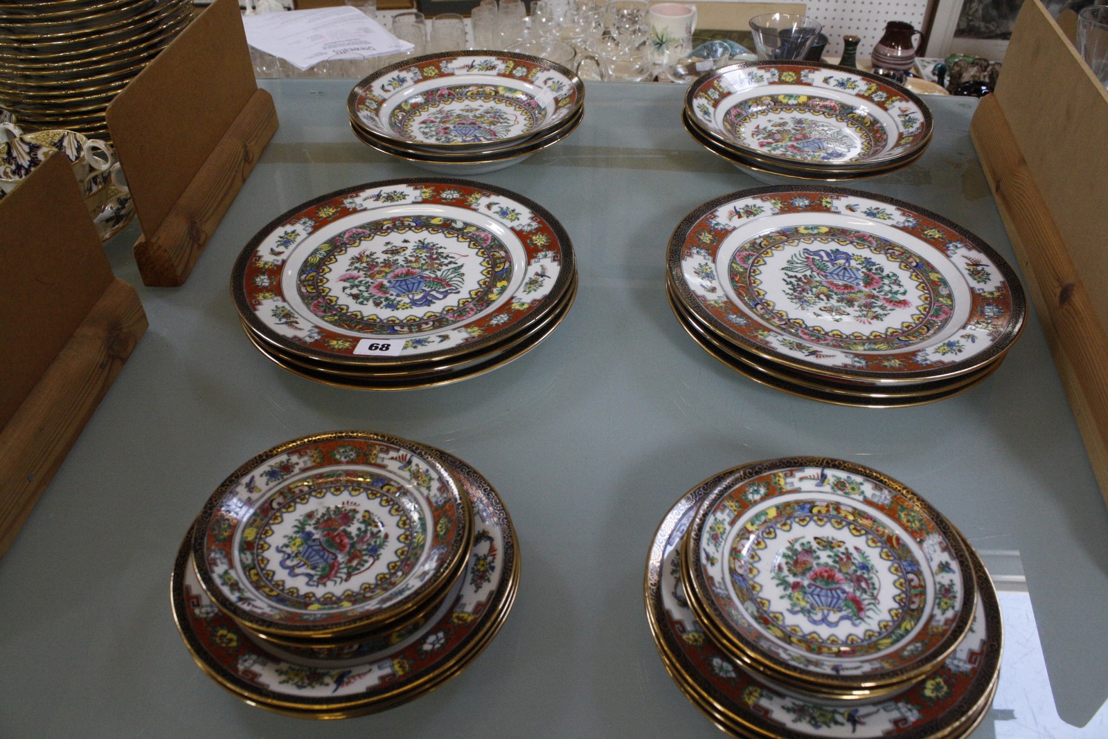 A Modern Chinese part dinner service to include plates, bowls and saucers, floral and butterfly