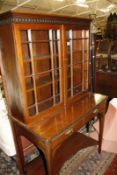 An Edwardian mahogany and glazed side table with bookcase in George III style, early 20th century,