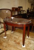 An Edwardian mahogany oval tray on stand and an oak cased Grand mother clock. Best Bid