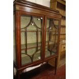 An Edwardian mahogany china display cabinet, raised on square tapering supports.109cm wide x 169cm