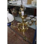 A brass hanging candelabra light