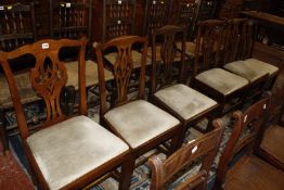 A harlequin set of six varying George III and later dining chairs