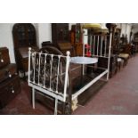 A brass and white painted bedframe (single), another pair of white painted bed ends and a pair