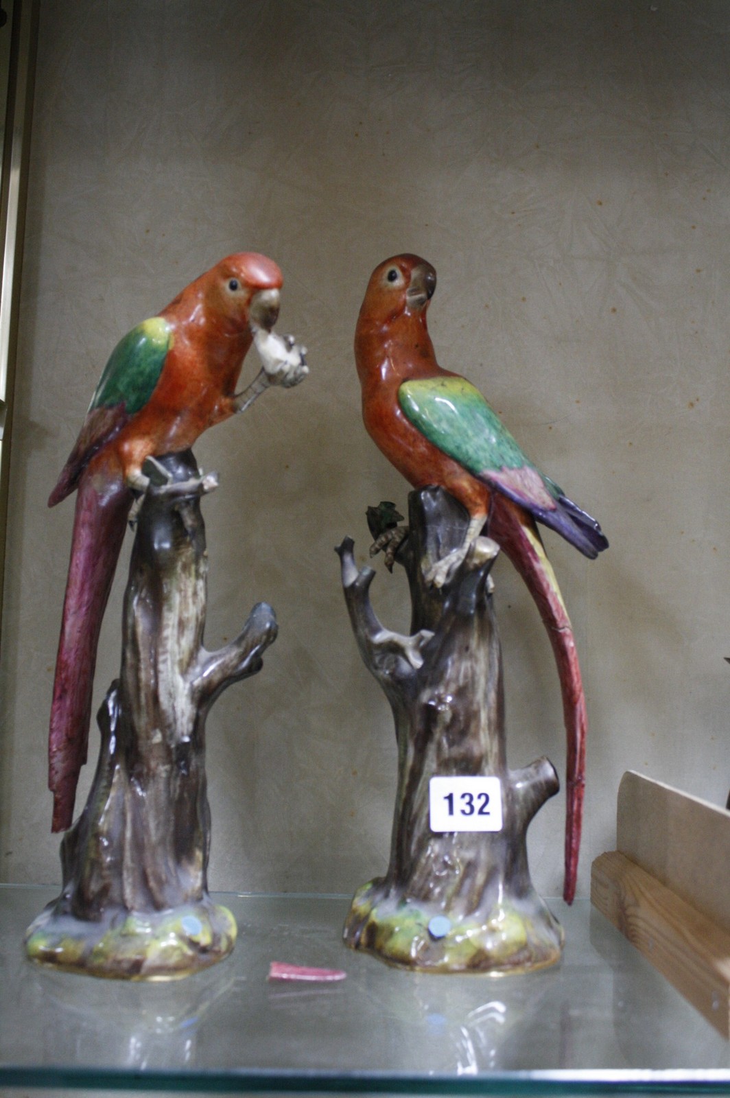 Pair of Meissen models of parrots, blue cross swords mark, 30cm and 18cm high (AF) Best Bid