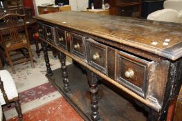 A late 18th Century oak dresser base with three drawers with potboard below.183cm wide x 53cm deep x