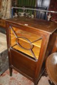 An Edwardian mahogany and glazed music cabinet, early 20th century and a mahogany and cross banded