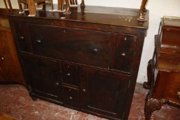 A stained chest with an arrangement of drawers and cupboards, second quarter of the 19th century (