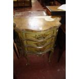 An Italian painted commode chest of serpentine outline