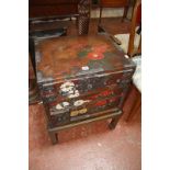 An Oriental lacquer cabinet on stand