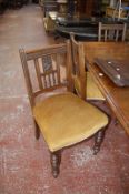 A set of six Edwardian dining chairs.